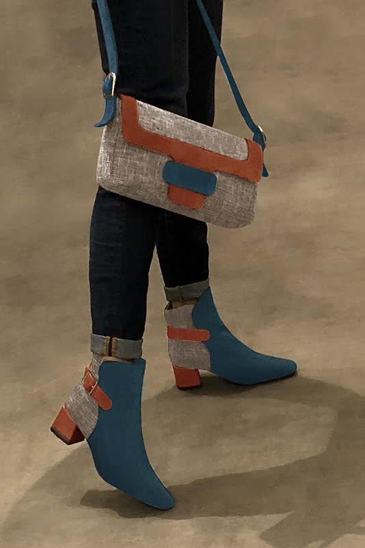 Peacock blue, natural beige and terracotta orange women's ankle boots with buckles at the back. Square toe. Medium block heels. Worn view - Florence KOOIJMAN